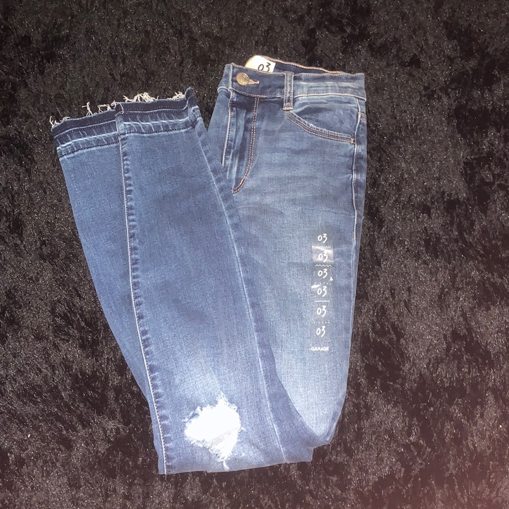 Size 3, GARAGE high rise jeans. In the color, MudHoney blue.